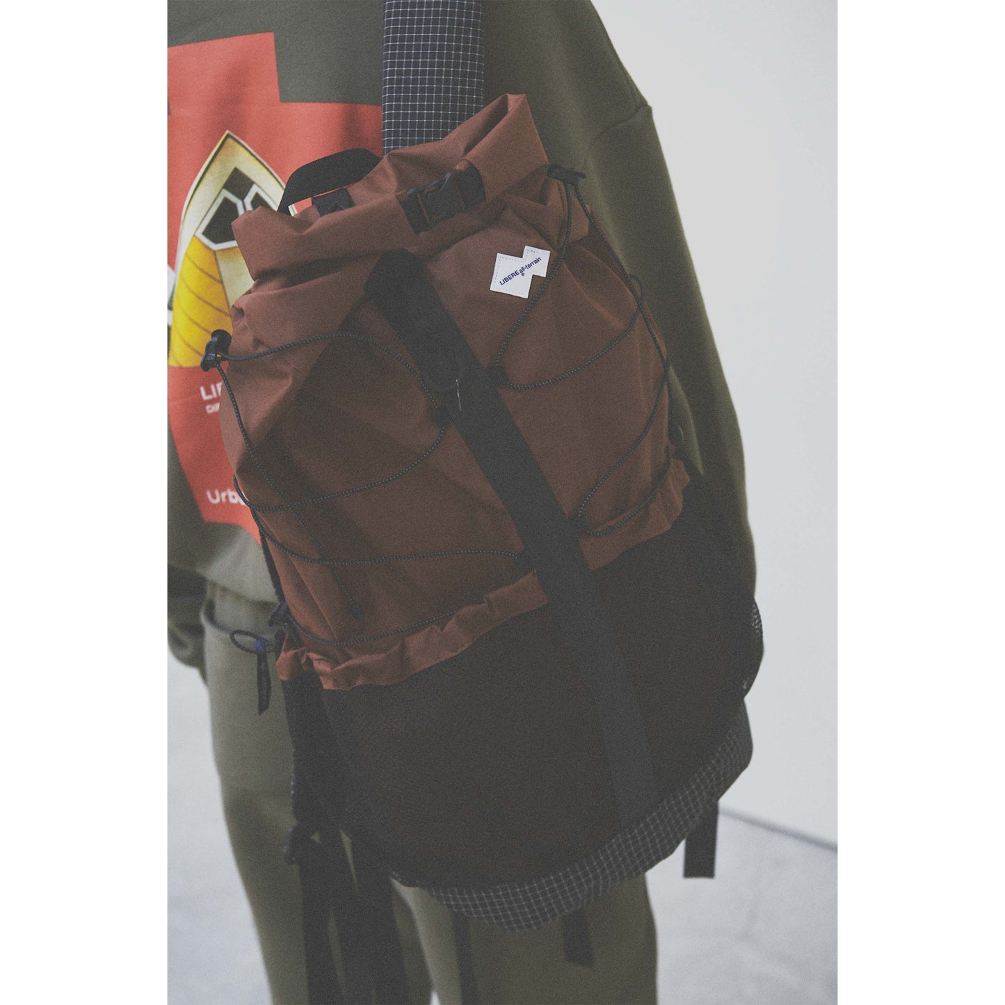 AT ROLLTOP BACK PACK / BRICK RED