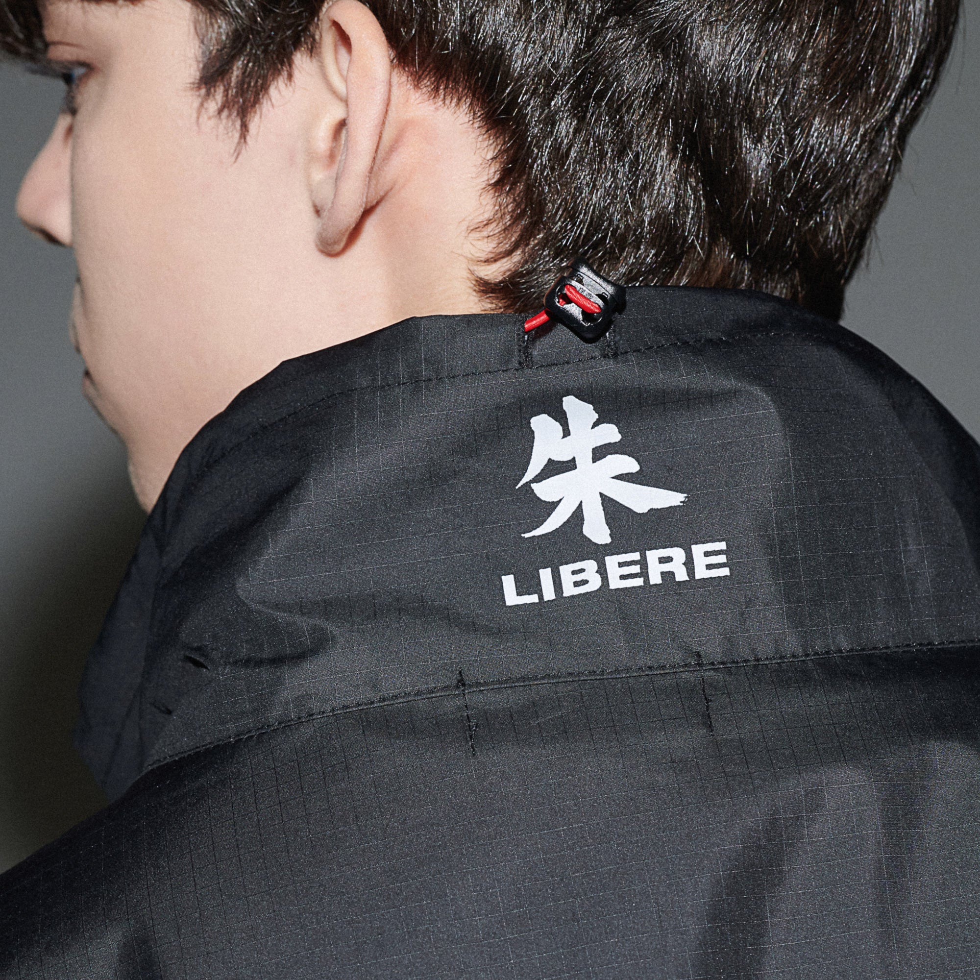 TEAM-AK PULLOVER JAKET / BLACK